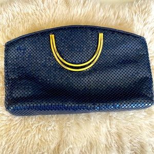 Lovely blue sequin evening bag with gold handles and top zip.